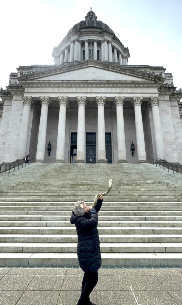 Archbishop Dominiquae Bierman blowing shofar